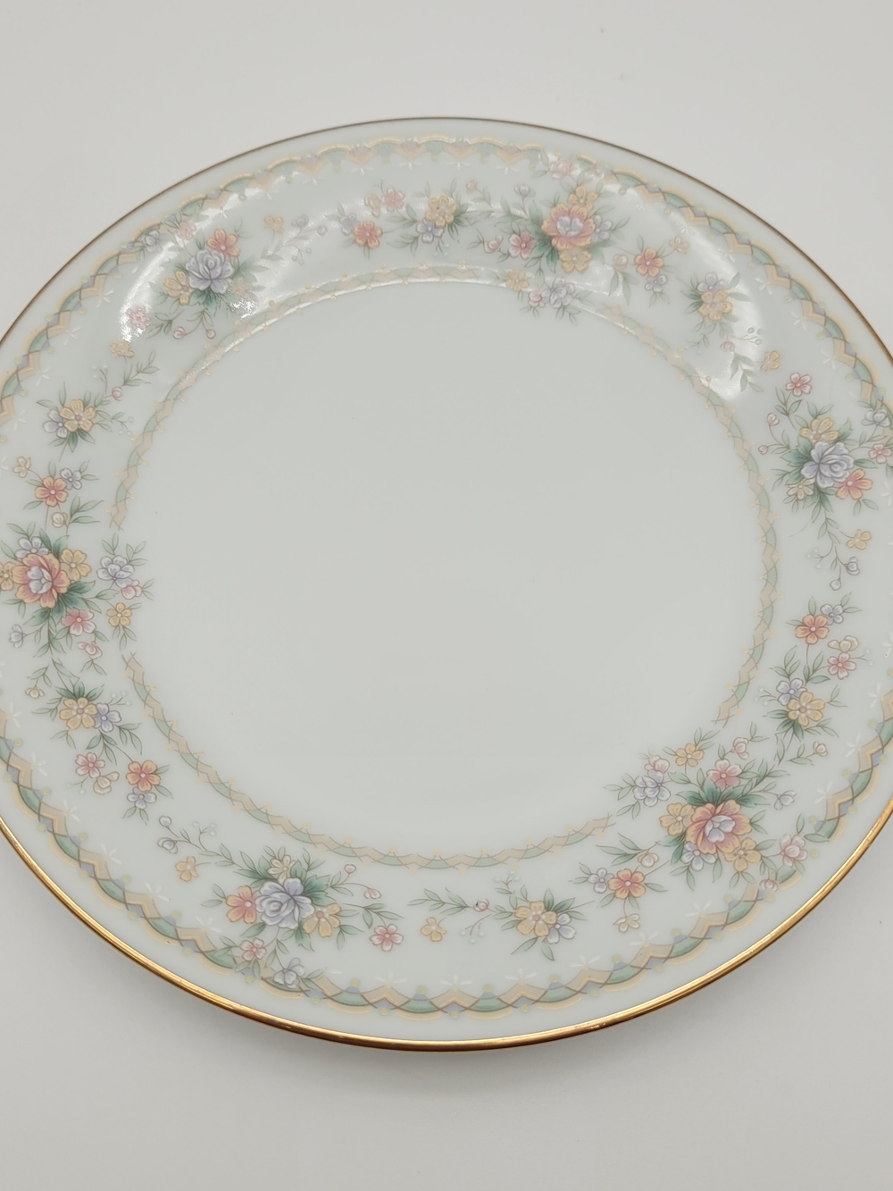 Noritake 3016 White Dinner Plate with Gold Rim and Pastel Floral Garland